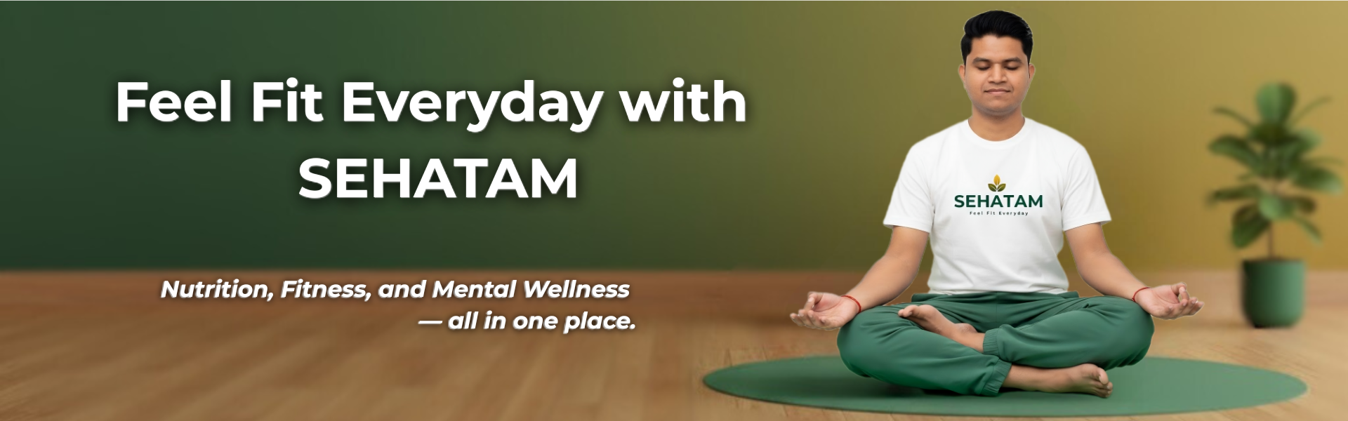 Man practicing meditation in a calm indoor setup wearing Sehatam t-shirt with text ‘Feel Fit Everyday with Sehatam’ promoting nutrition, fitness, and mental wellness.